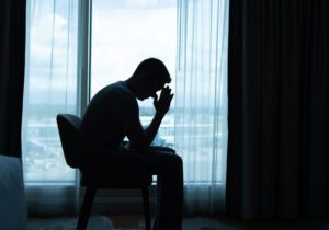 a depressed man who lost his job